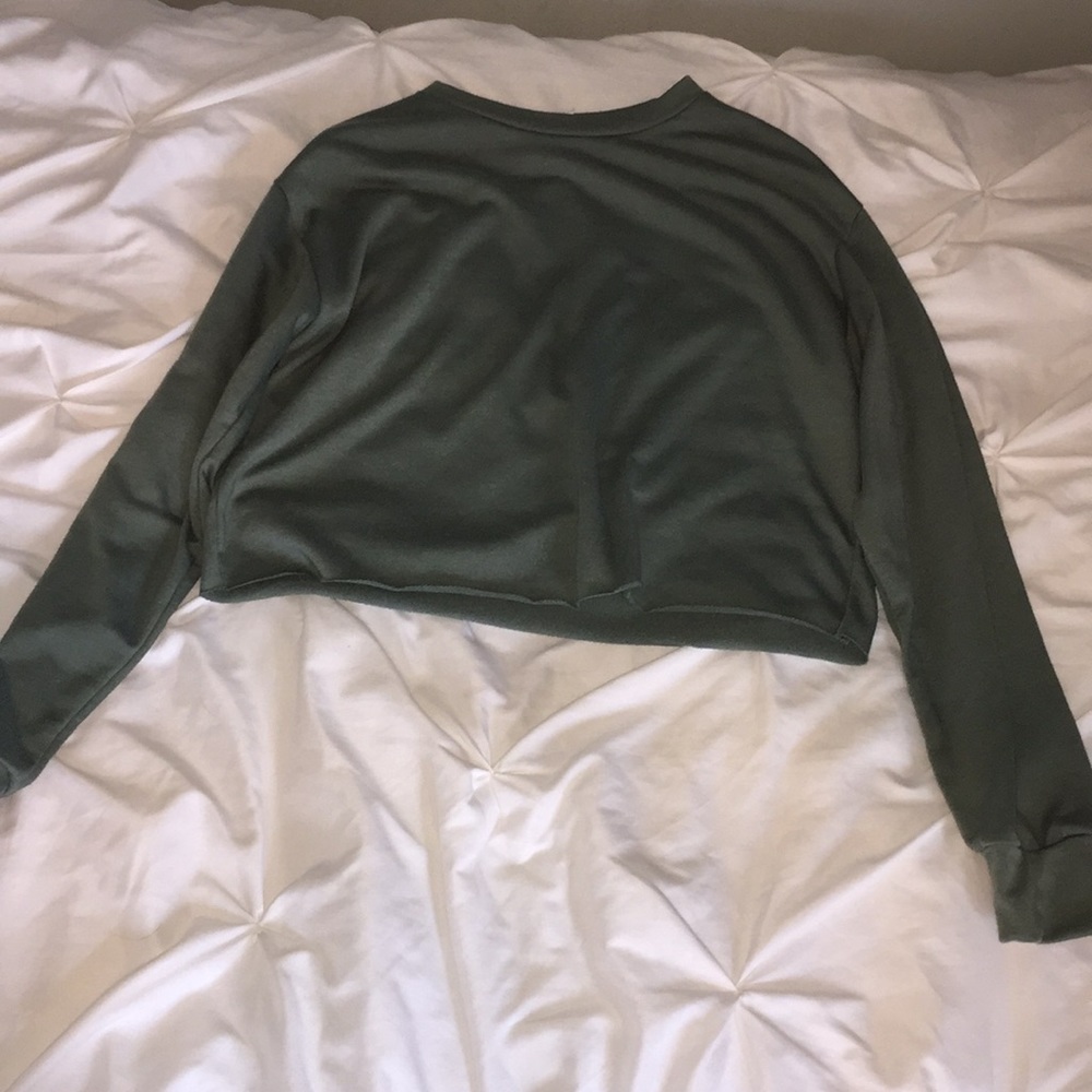 Green long sleeved shirt